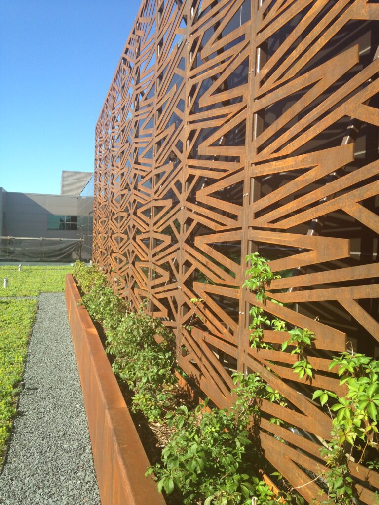 weathering steel, corten, decorative metal , metal fence, airport fence