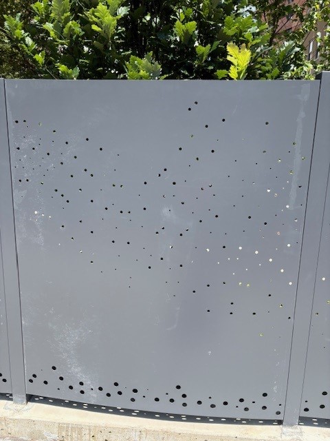 nebula, stellarcraft, perforated fence, perforated metal, metal design, architectural metal
