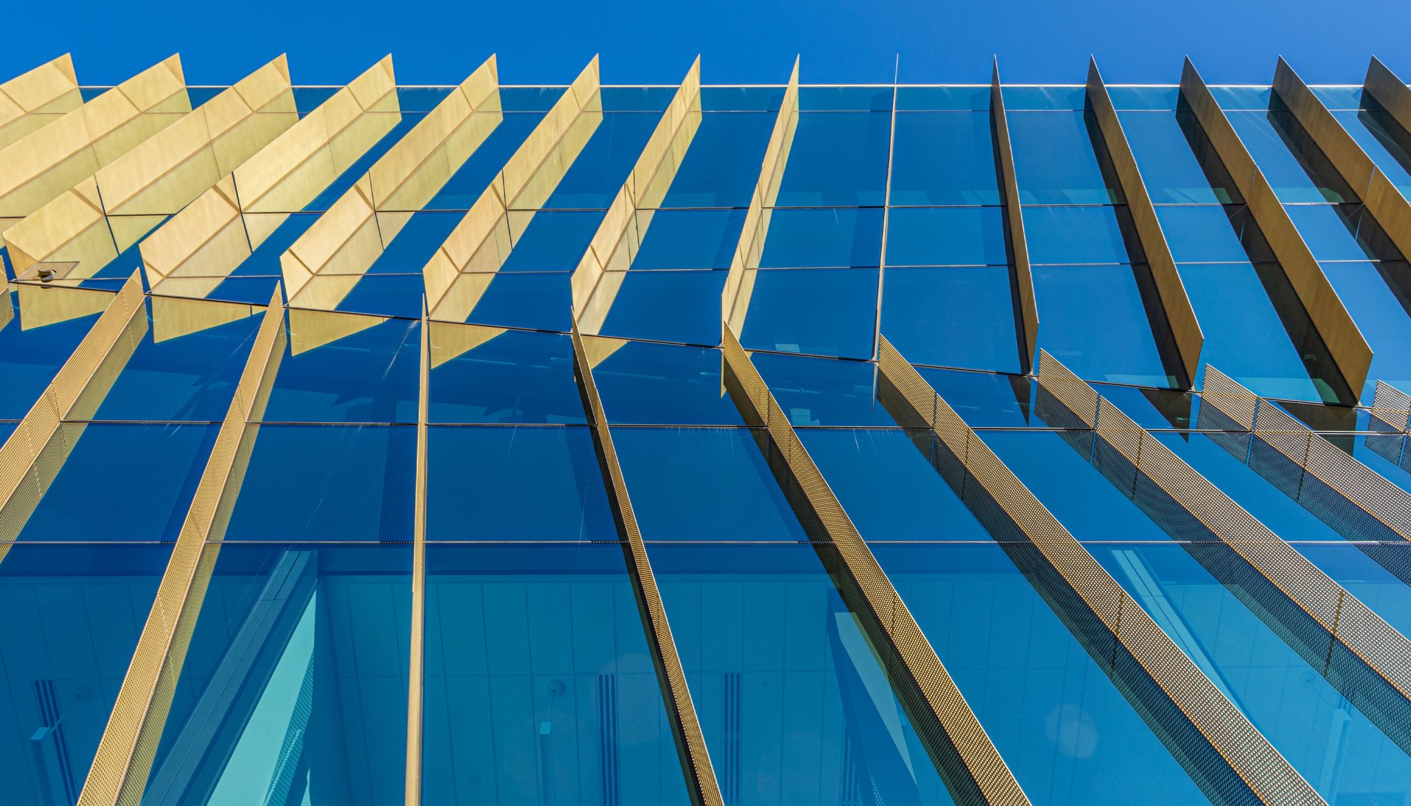 perforated sunshades for AWSOM building glass facade