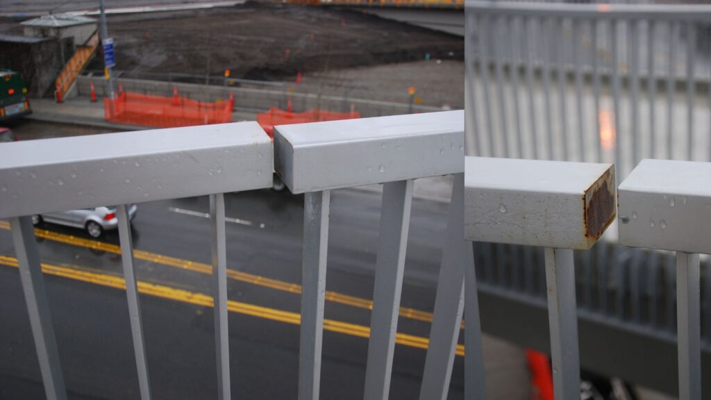 corroding guardrail bridge railings installed