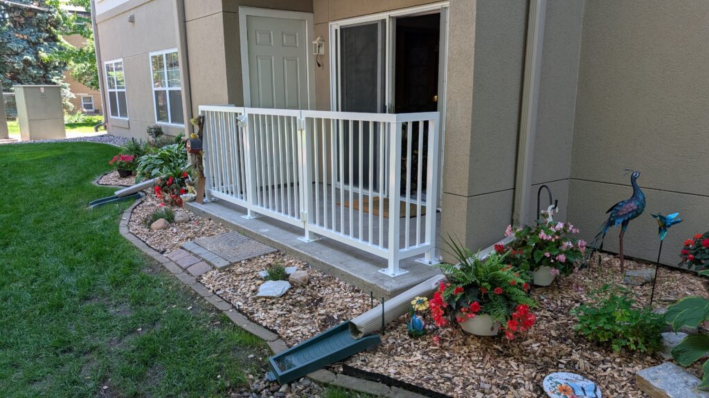 ground level apartment balcony with gate