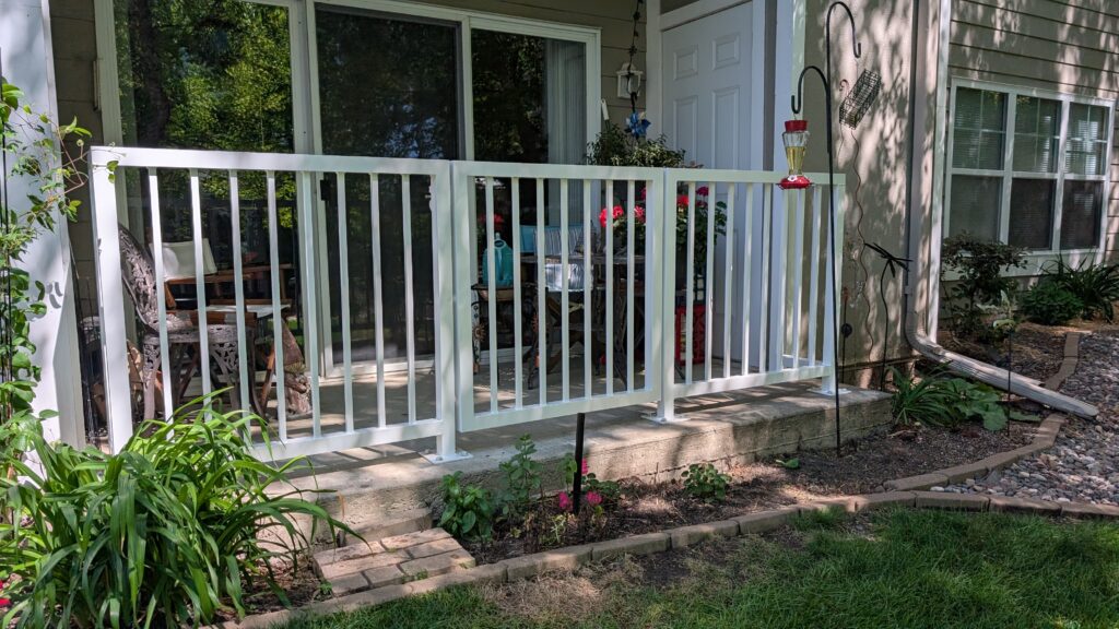 ground level apartment balcony with gate