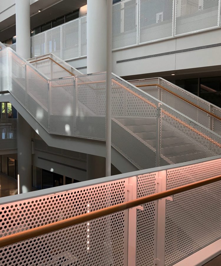 perforated metal guardrail for three story staircase